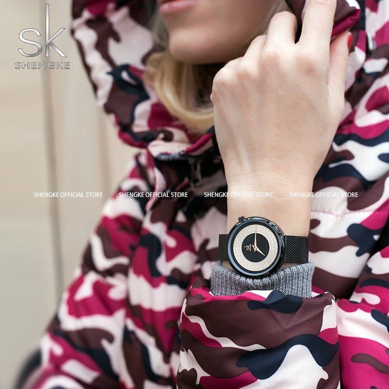 Shengke Reloj femenino con diseño de malla de metal, moda, vintage y lujo. Reloj de diseño clásico para mujeres de la marca de lujo.