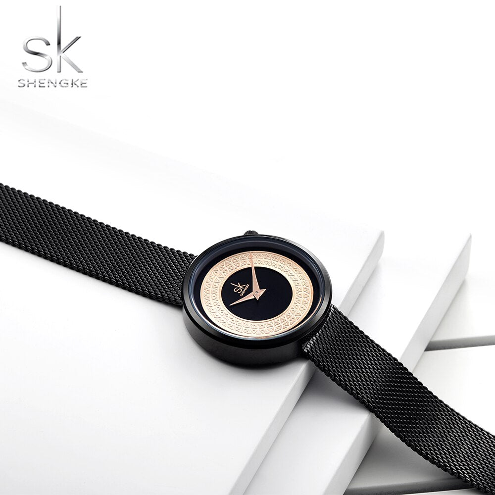 Shengke Reloj femenino con diseño de malla de metal, moda, vintage y lujo. Reloj de diseño clásico para mujeres de la marca de lujo.