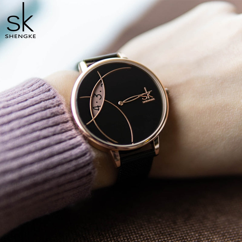 Shengke Reloj de Moda para Mujer, Creativo y Casual, con Correa de Malla de Acero Inoxidable, Elegante Diseño en Plata, Reloj de Cuarzo para Mujeres.