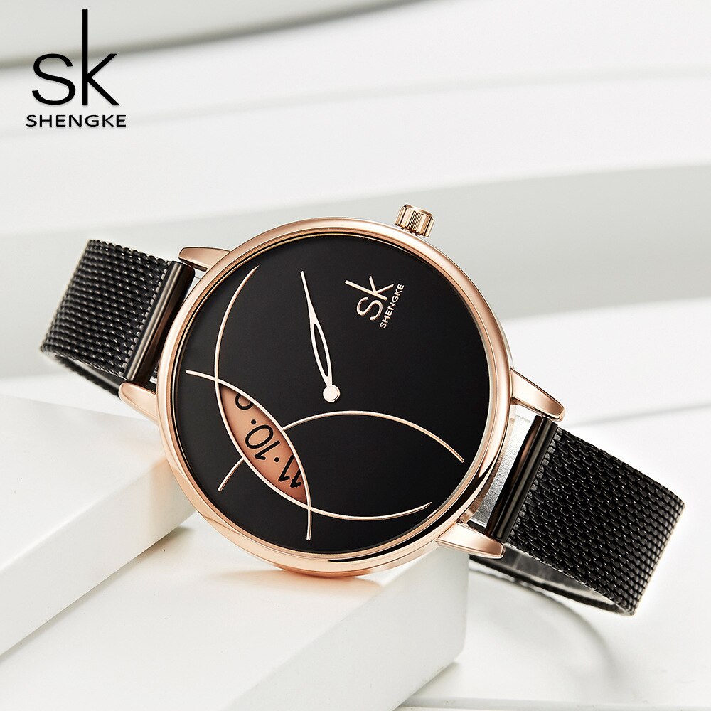 Shengke Reloj de Moda para Mujer, Creativo y Casual, con Correa de Malla de Acero Inoxidable, Elegante Diseño en Plata, Reloj de Cuarzo para Mujeres.