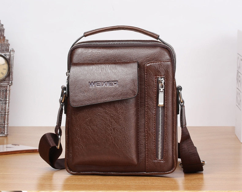 👜🕶️🎒 Bolsa de hombro para hombres con estilo vintage y alta calidad. Hecha de cuero genuino, es un accesorio duradero y elegante. Perfecta para llevar tus pertenencias en cualquier ocasión. ¡Una opción imprescindible para los hombres con estilo! 👔💼🔝